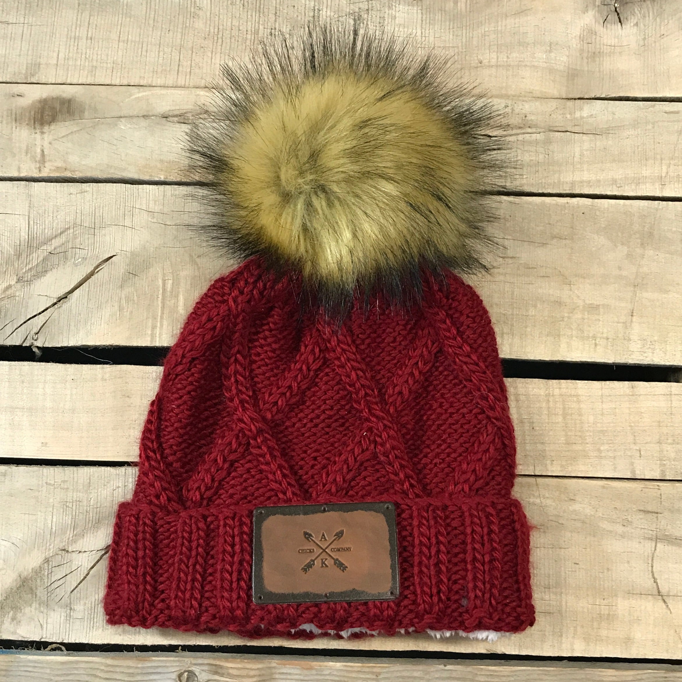 Cross Knit Faux Puff Hat – Alaska Chicks Co