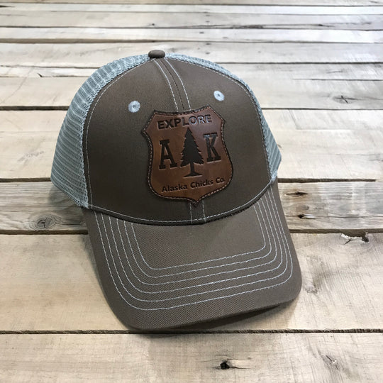 Explore AK Shield Patch Trucker Hat