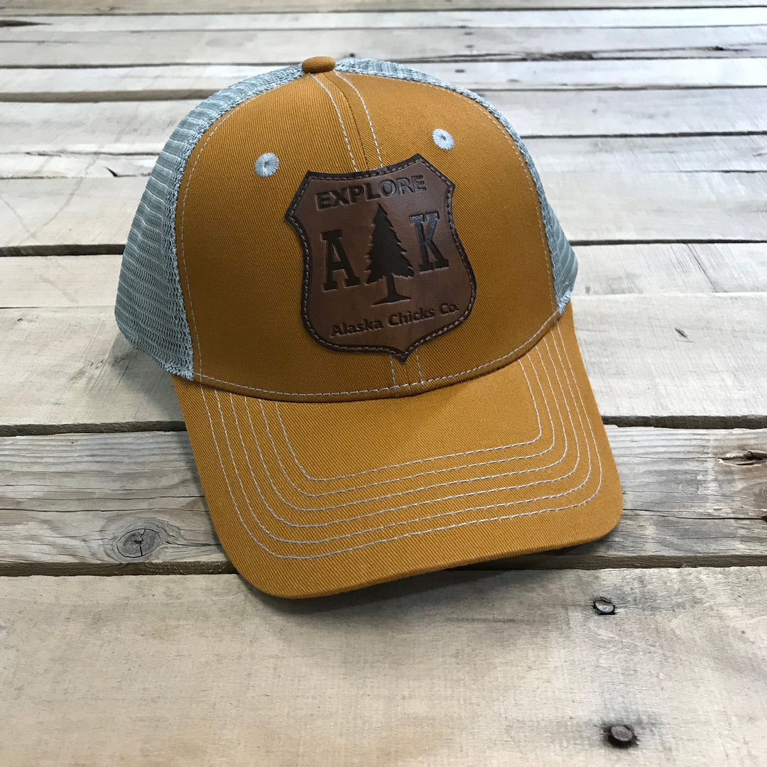 Explore AK Shield Patch Trucker Hat