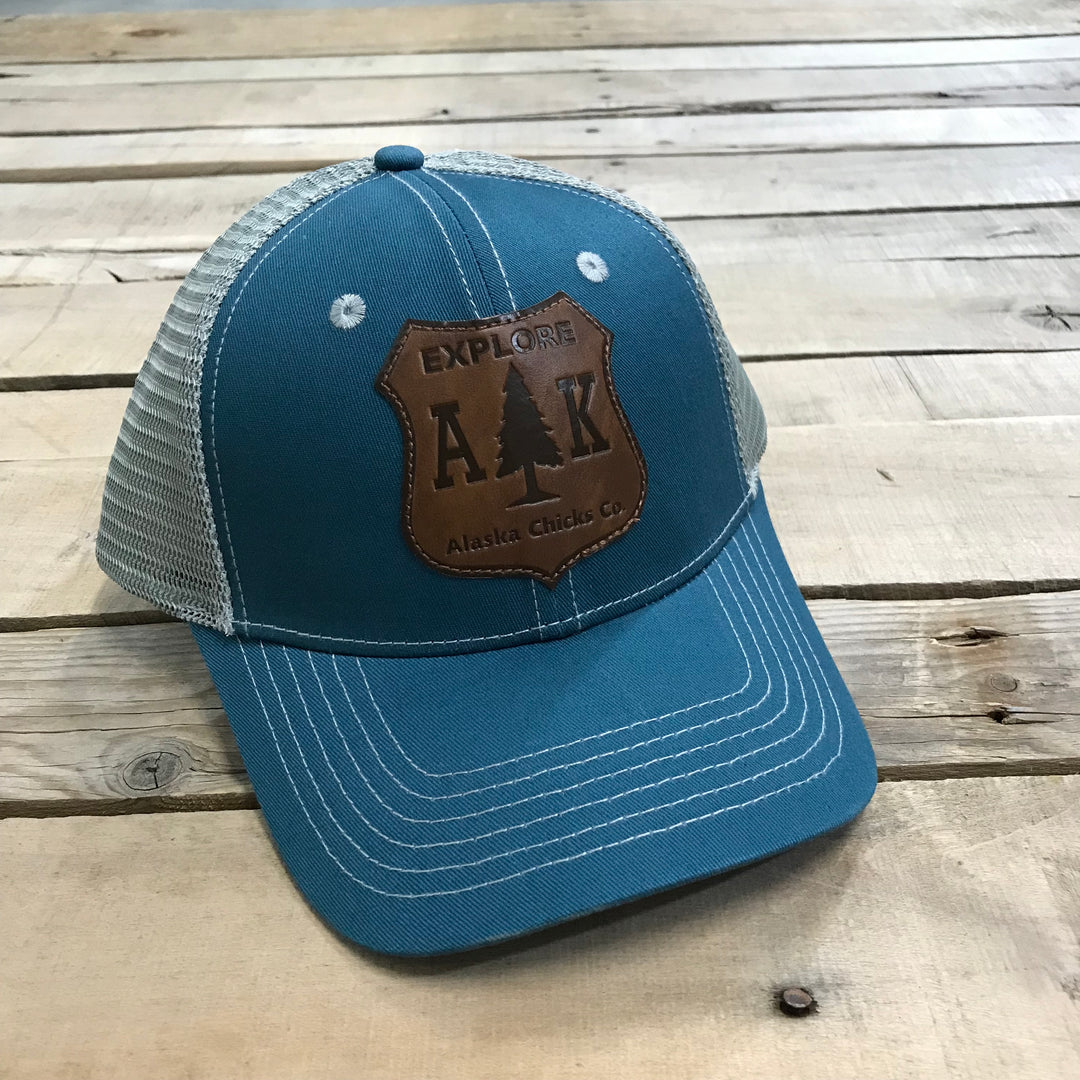 Explore AK Shield Patch Trucker Hat